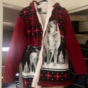 A light Winter Sweaterlike Coat with Wolves on it.  Excellent Condition!